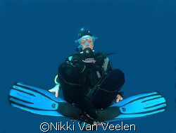 My buddy doing some "yoga" underwater, taken at Sharks Ob... by Nikki Van Veelen 